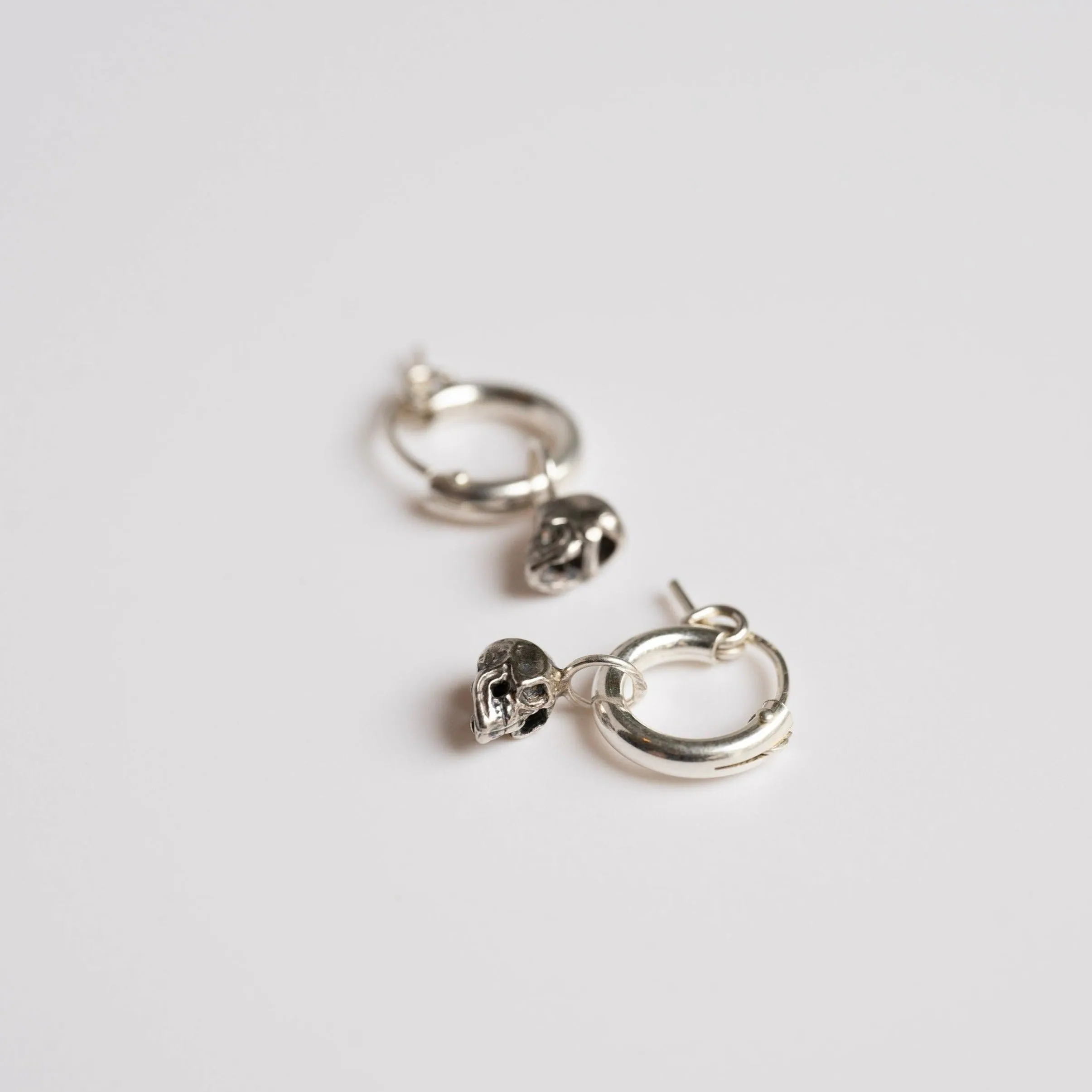 Petite Skull Huggie Hoop Earrings in Sterling Silver